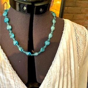 Ice blue glass ladybug necklace 18”